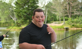 boy throwing a shaka