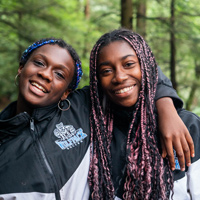 Two girls smiling